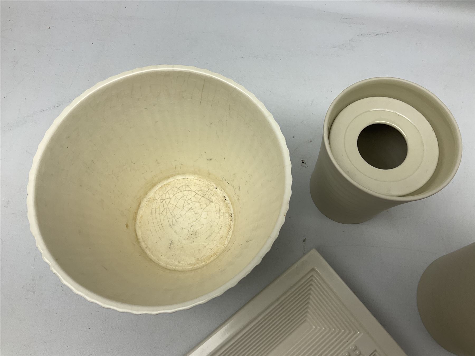 Hornsea Pottery Rainbow planter by John Clappison, together with two Horsea Concept vases with flower holders and Hornsea Stadium dish, largest example H16cm