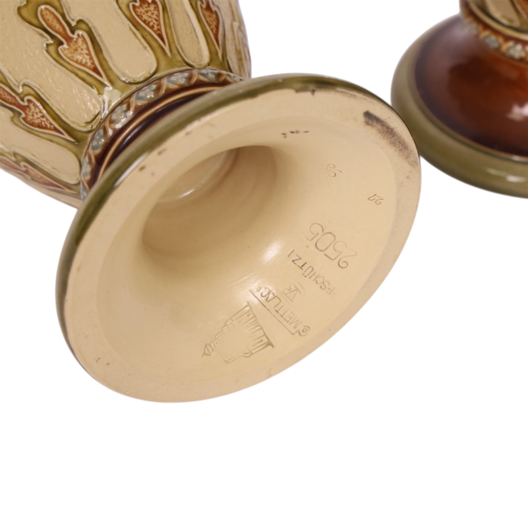 Villeroy & Boch Mettlach, pair of twin handled vases, decorated with floral panels and beaded neck, model 2505, H34cm 