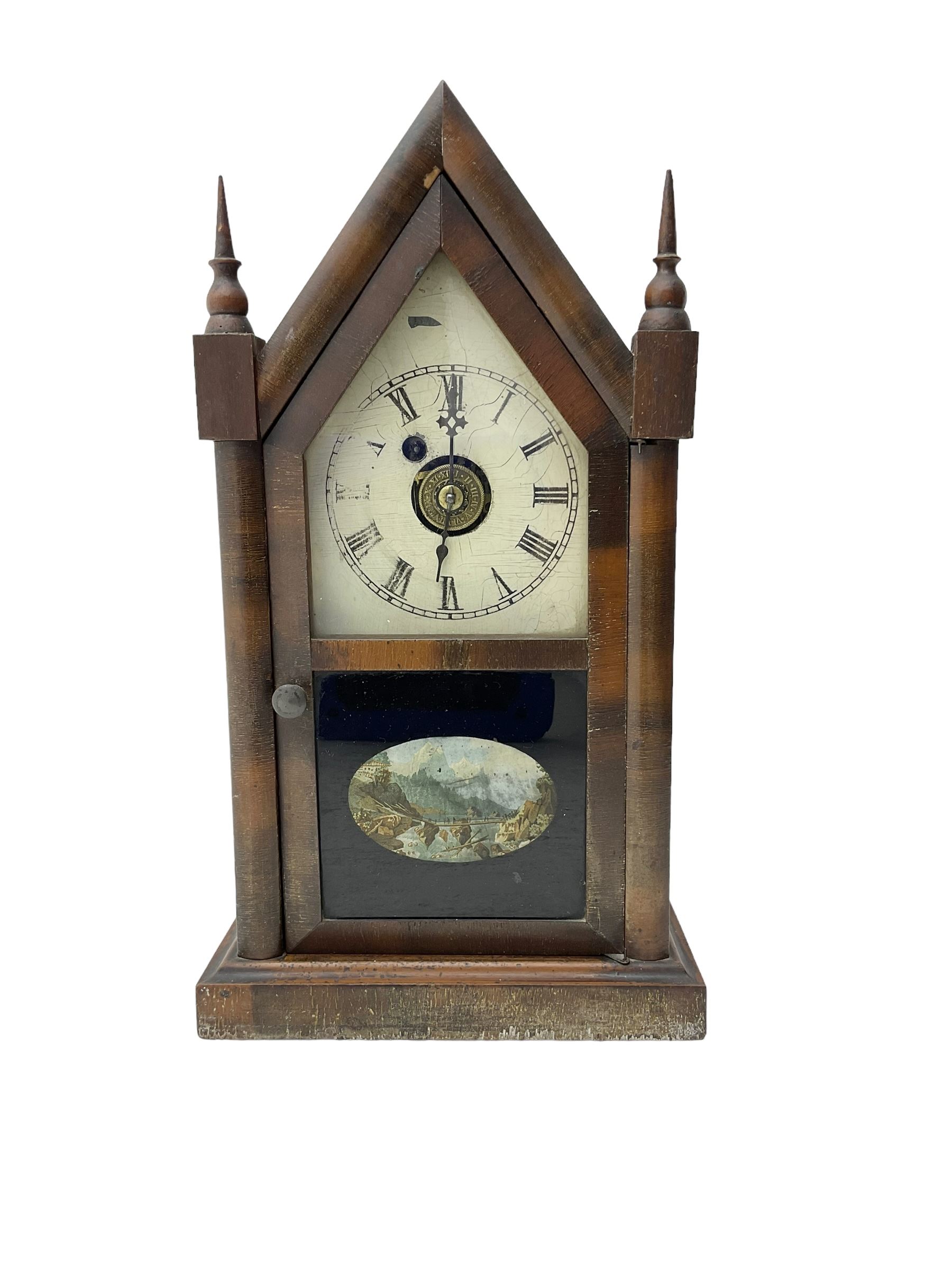 Late 19th/early 20th century American Waterbury Clock Company Gothic style mantel clock with 8-day movement and alarm facility striking on a bell H38cm