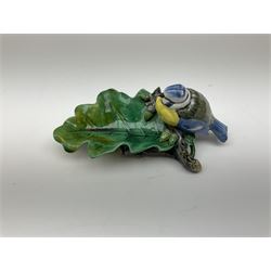 Minton majolica leaf dish, modelled as a Blue Tit perched on a branch with acorns and an oak leaf, date cypher for 1868, impressed marks beneath, L21cm. 