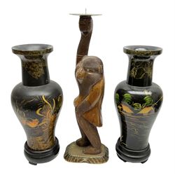 Pair of Japanese vases of baluster form decorated with koi fish and fishing village scene with gilt, the neck and rim with marble effect decoration, raised upon circular plinth bases, together with a carved wood figural candlestick of a monkey butler style figure with brass base, tallest H48cm
