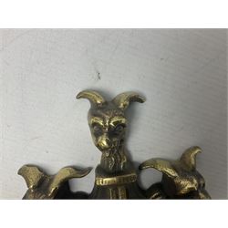 Gothic style cast brass door knocker, modelled with the Greek three-headed hell hound Cerberus on Rococo style base with central knocker of tear drop above Hades, God of the underworld, L29cm