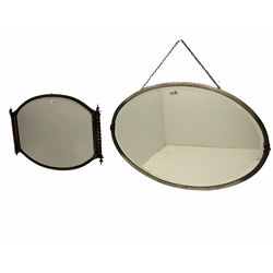 Early 20th century oval wall mirror in bronzed metal frame with barley twist pilasters, and an oval wall mirror