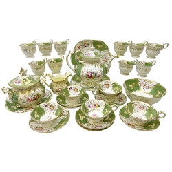  19th century porcelain tea service in the manner of Coalport, decorated with gilt bordered reserves on green ground, painted with sprays of summer flowers, comprising large teapot, sucrier & stand, milk jug, slop bowl, two cake plates, six tea cups & seven saucers and ten coffee cups, pattern no. 2/657   