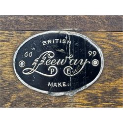 Leeway - late 19th century light oak child's roll-top desk, tambour top opening to reveal fitted interior with green felt writing surface and five pigeonholes, over three graduated drawers on the right side, raised on panelled side supports