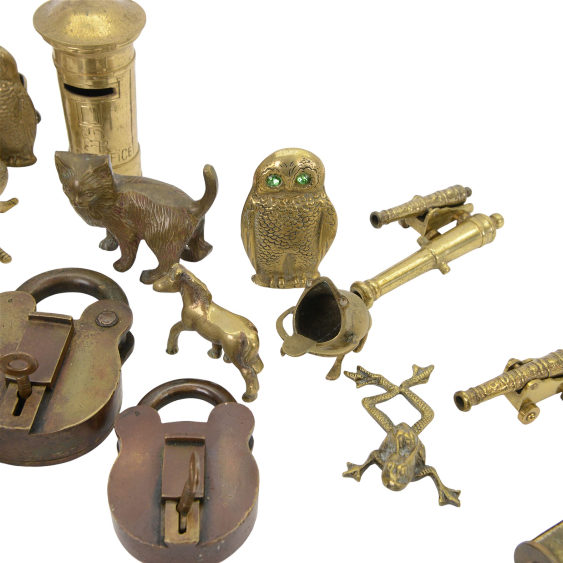 Collection of brassware, including money box in the form of a post box, cannon, jardiniere etc  