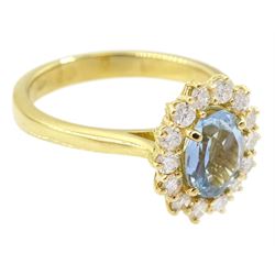 18ct gold oval cut aquamarine and round brilliant cut diamond cluster ring, hallmarked, aquamarine approx 0.85 carat, total diamond weight approx 0.40 carat