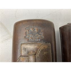 Victorian leather cigar protector with metal match striking plate on the end and internal spring to hold the cigars in place; expands for differing lengths of cigar, minimum L12.5cm; another similar leather cigar case marked Middlemore's Patent with attached vesta case and striker; three Bryant & Mays tin-late matchbox holders including 1935 Jubilee; and small box of matches (6)