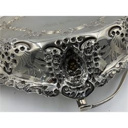 Edwardian silver swing handled basket, of navette form, with four repousse lion masks to each corner and with pierced and embossed floral, scroll and shell decoration to sides, base and handle, hallmarked Charles Horner, Birmingham 1906, height including handle H20cm