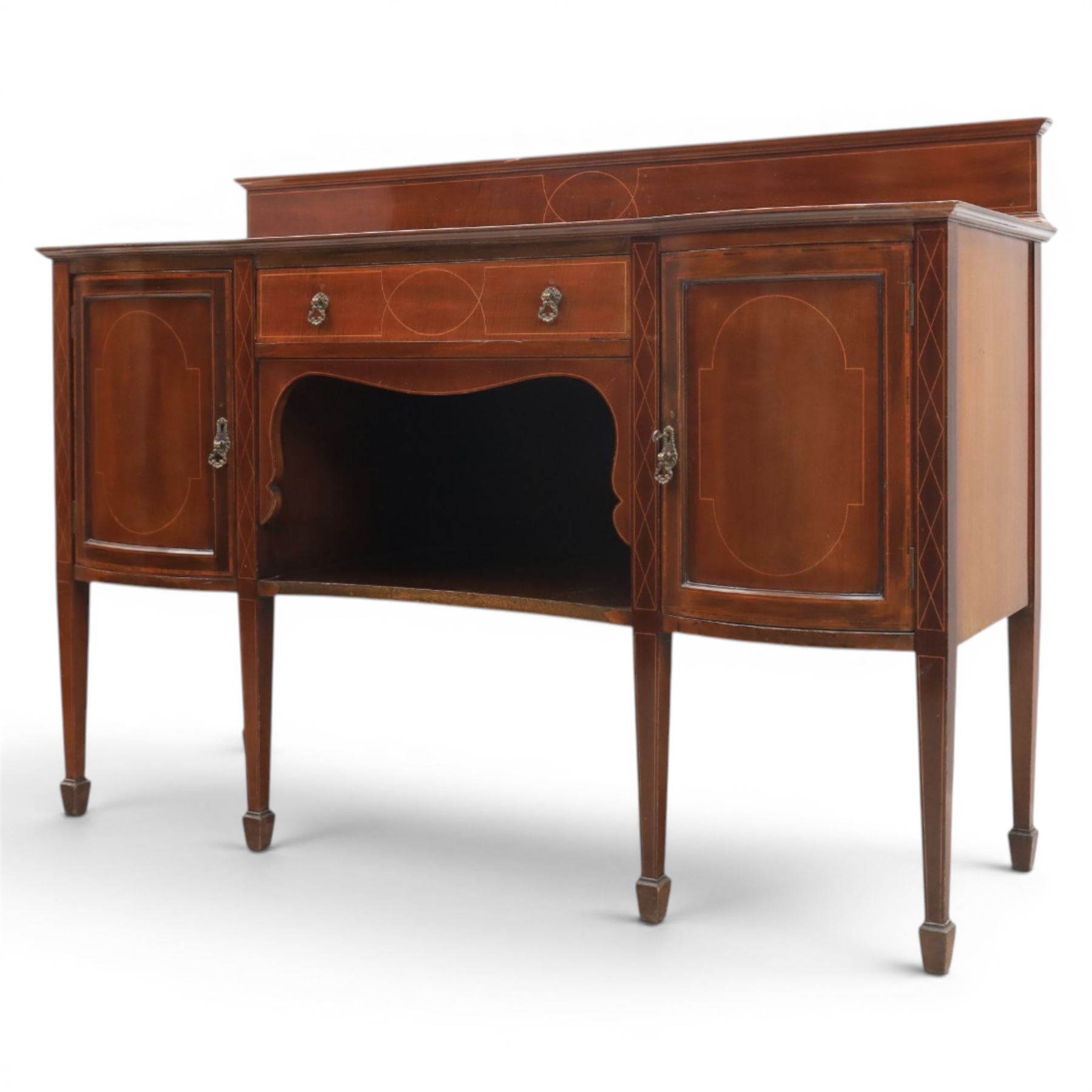 Edwardian mahogany and satinwood sideboard, shaped top with galleried back, with freize drawer flanked by two cabinets, united by undertier, raised on square tapering supports terminating in spade feet