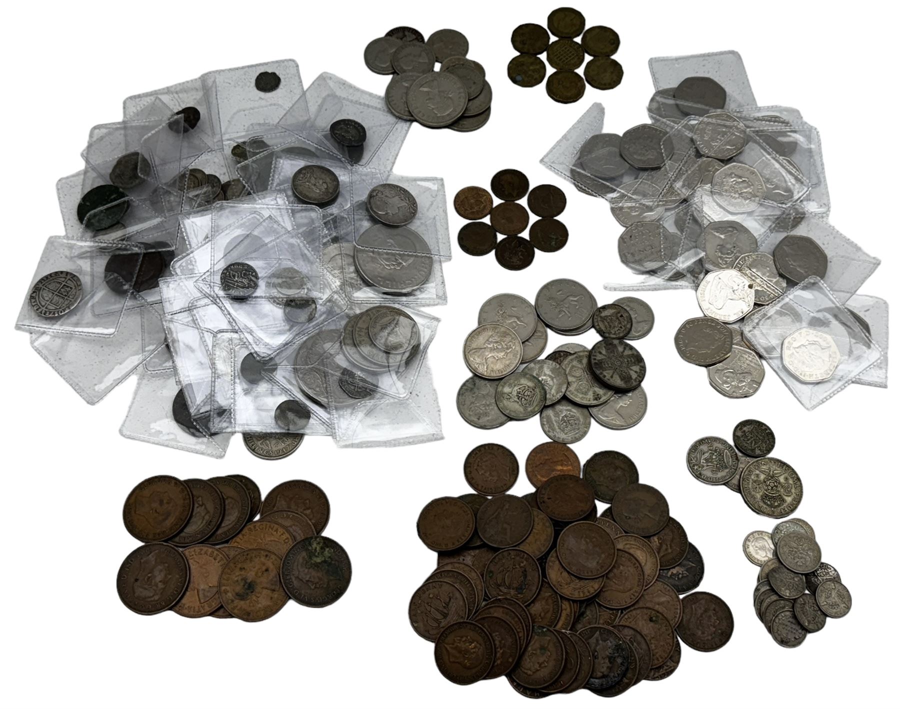 Coins including Elizabeth I 1573 sixpence and other hammered silver coins, commemorative fifty pence pieces with 2003 'Give Women The Vote', 2017 'Benjamin Bunny', 2017 'The Tales of Peter Rabbit', 2019 'Sherlock Holmes', small quantity of Great British pre 1947 silver coins, commemorative crowns, spade guinea style gaming tokens etc