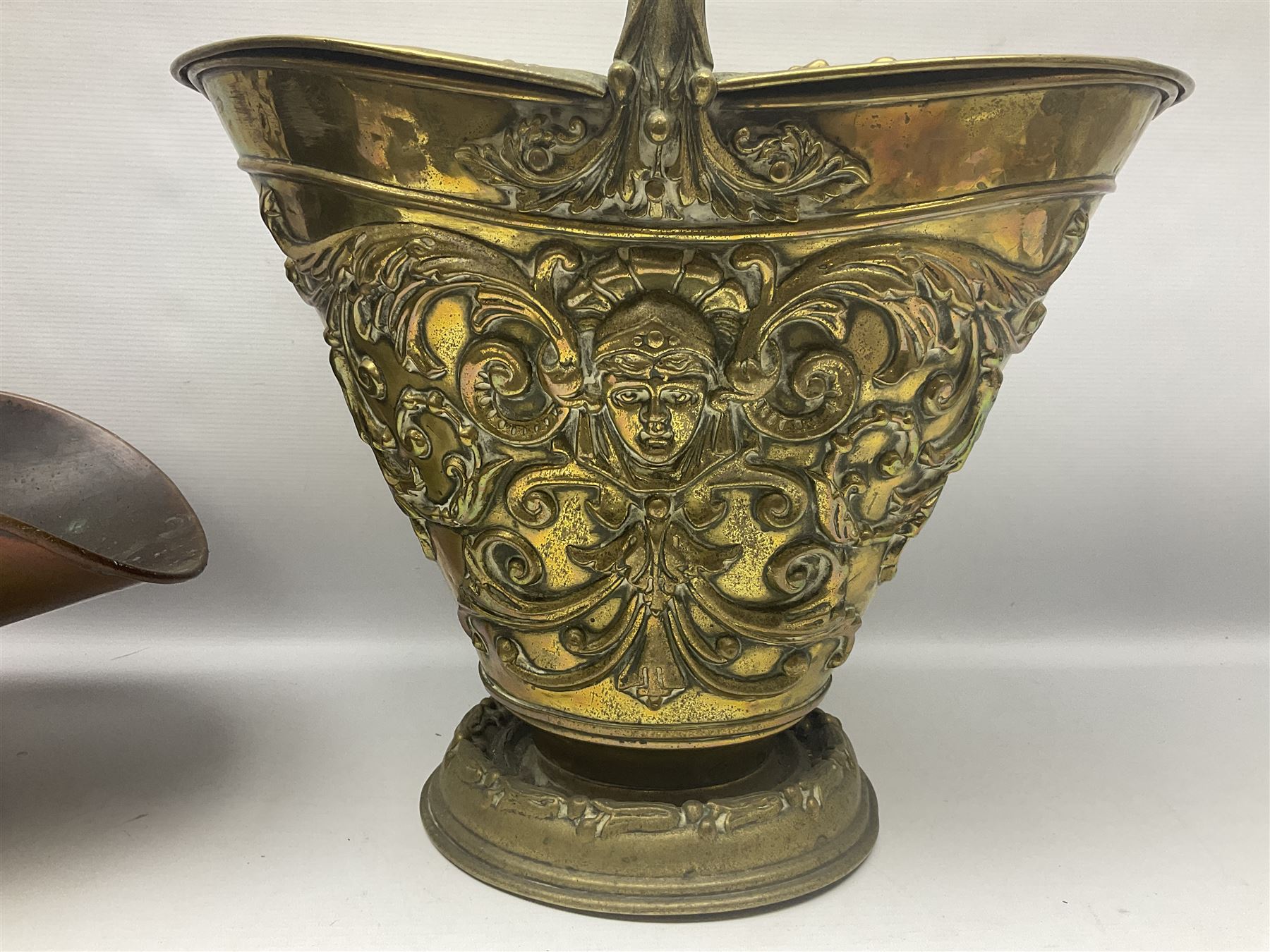 Victorian Benham & Froud Arts and Crafts brass coal scuttle, with Victorian diamond registration mark, together with a copper and brass scuttle of helmet form, tallest H50cm
