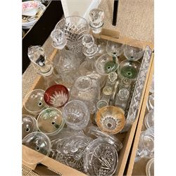Assorted glassware, to include decanters of various form, various drinking glasses, cruet set in stand, tray, jars and covers, etc., in two boxes 