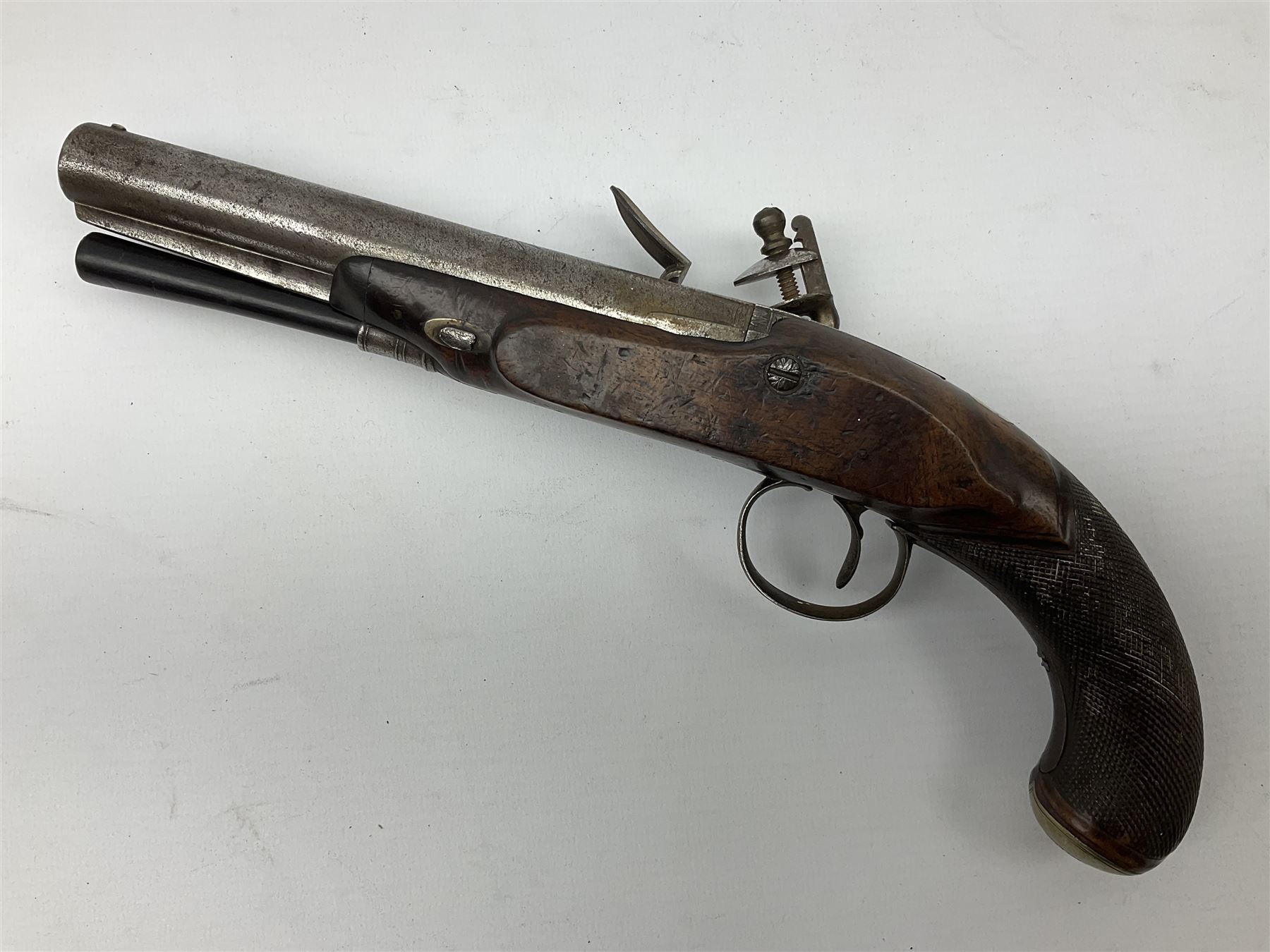 Early 19th century flintlock pistol by George Wallis Hull, the 16cm barrel with ram rod under, chequered walnut stock with sunburst engraved German silver butt cap and horn fore-ends, engraved steel furniture with pineapple finial, gold poincon for Hull to top of barrel and for Wallis to lock plate 30cm overall
