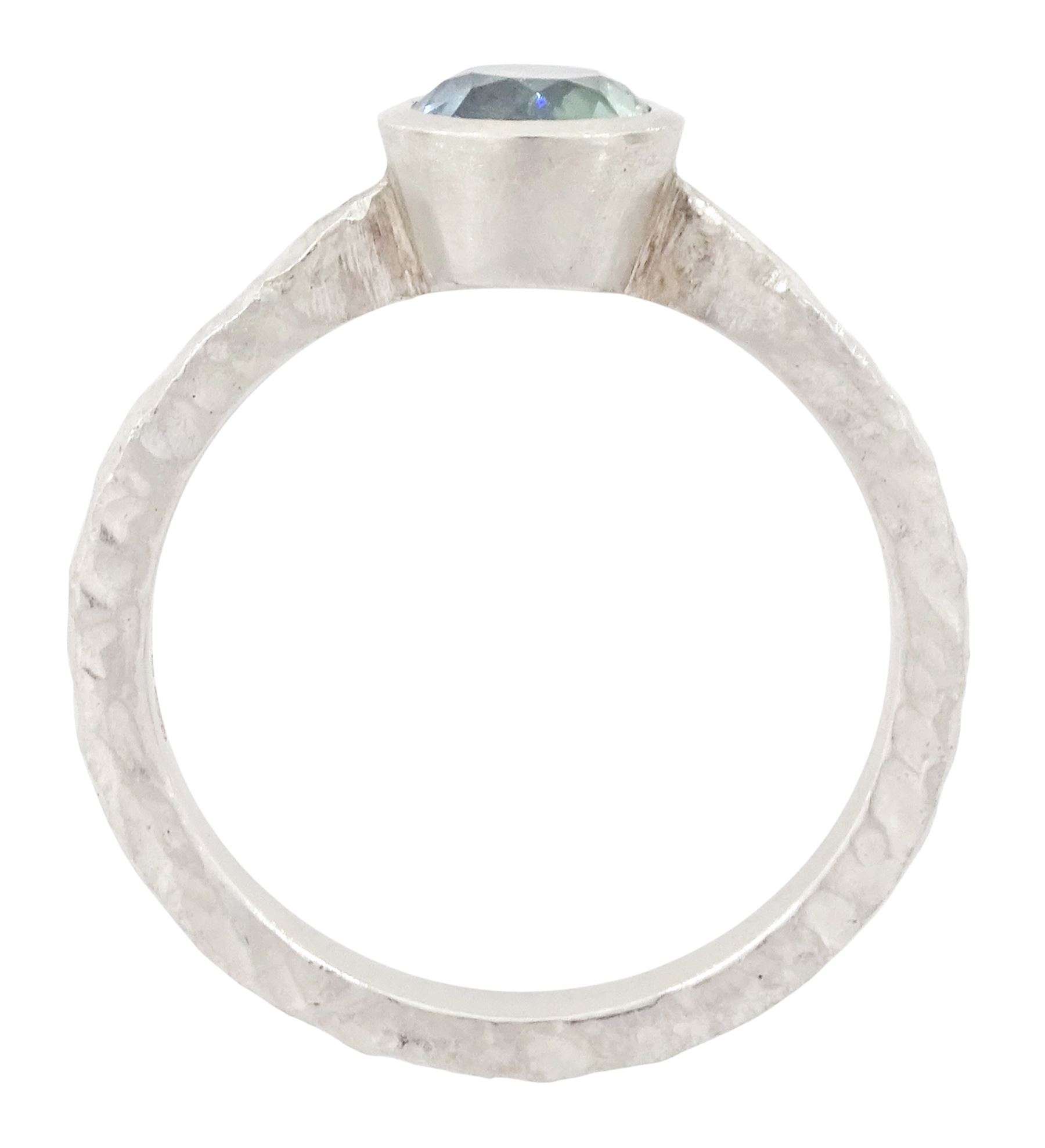 Platinum sapphire ring, single bezel set sapphire of approx 1.00 carat, to a planished shank, London 2019