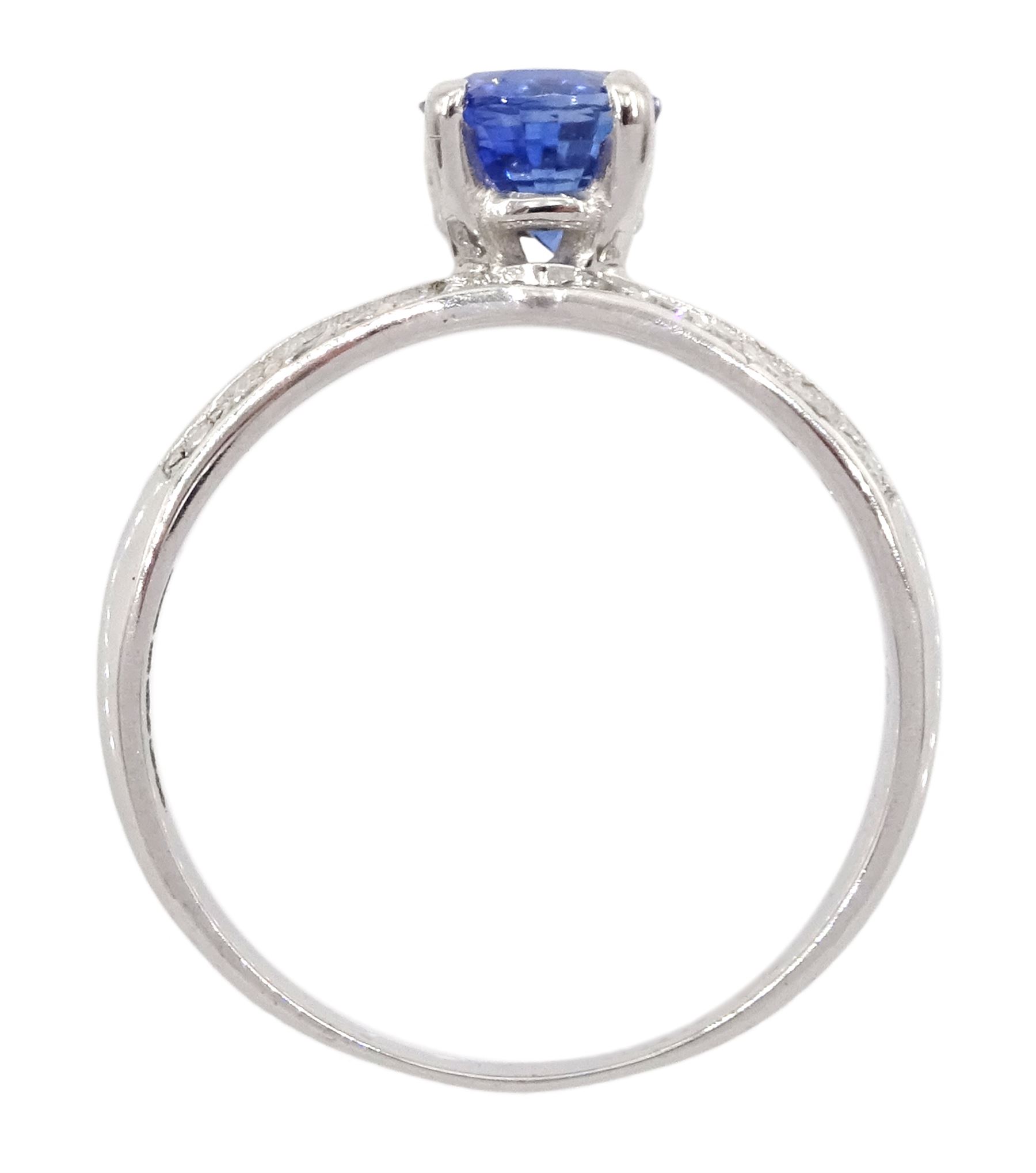 White gold sapphire and diamond ring, single oval cut sapphire of approx 1.00 carat, with split design diamond set shoulders, hallmarked 14ct