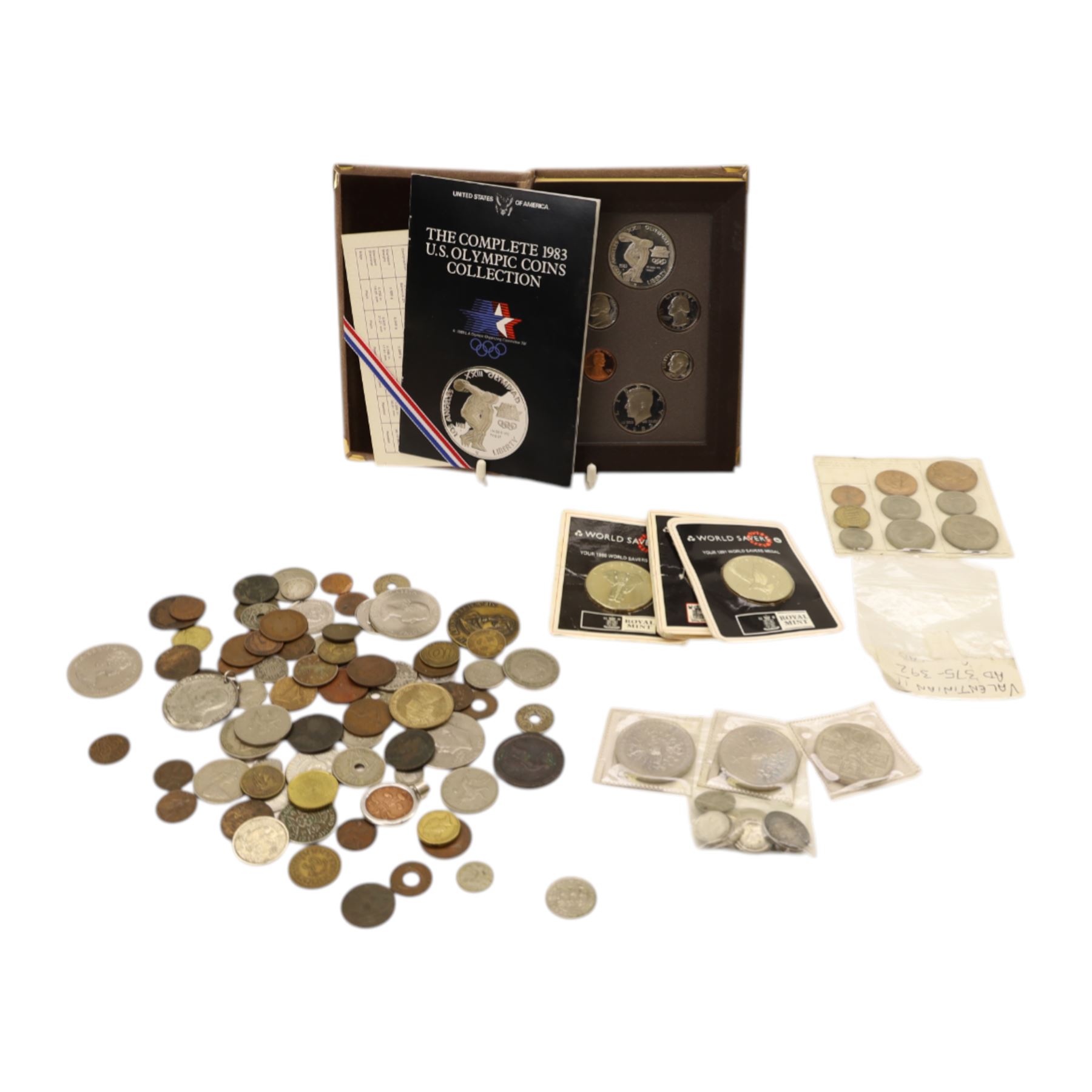 Great British and World coins, including two Roman coins, Maximianus and Valentinian II, approximately 16 grams of Great British pre-1920 and approximately 25 grams of Great British pre-1947 silver half crown coins, The Complete 1983 U.S. Olympic Coin Collection (containing silver dollar), commemorative crowns, etc