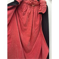 Full length 1930's childs black velvet cape, with ruched collar and red velvet lining, with a single button neck fastening 