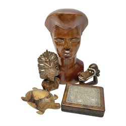 20th century wooden carvings from the Solomon Islands, including female bust in headdress, turtle etc  