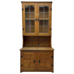 Gnomeman - adzed oak dresser, arcade carved cresting rail over two lead glazed doors, double cupboard below enclosed by two panelled doors, carved with gnome signature, by Thomas Whittaker, Little Beck 