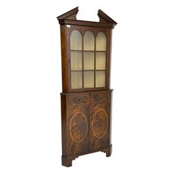 Georgian design inlaid mahogany corner cabinet, broken dentil pediment over single glazed door enclosing two shelves, base fitted with two doors with faux drawer facias