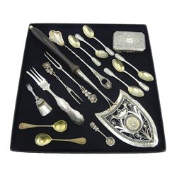 19th century German silver cake knife, openwork and embossed decoration with ebony handle and ivory finial, silver hinged lidded boxed stamped 800, Dutch silver three pronged fork, Dutch caddy spoon, set of six silver-gilt coffee spoons and other continental silverware, all stamped or hallmarked