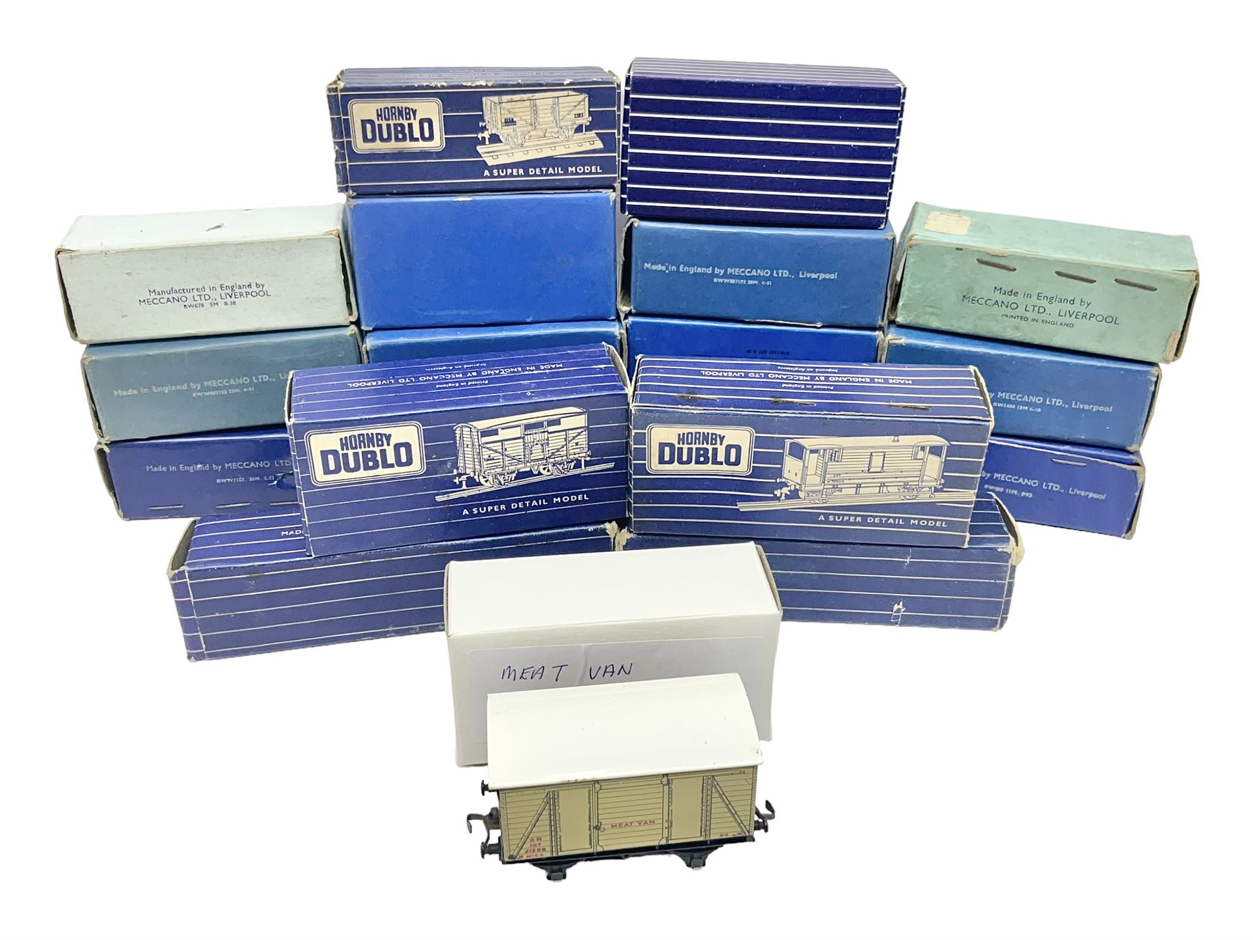 Hornby Dublo - nineteen goods wagons comprising 32040 Goods Van D1 (SR) in LMS stickered box, DR375 Goods Van D1 (GW), D303 Open Goods Wagon D1 (GW), 32044, 32076, 32052, 32021, 32074, 32056, 32065, DR379, 32070, 32020, DR373, two x 32075, High Sided Wagon D2 (LMS) in NE stickered box; all boxed; Tank Wagon D1 (Esso) and DR380 Meat Van D1; both in later unassociated boxes (19)