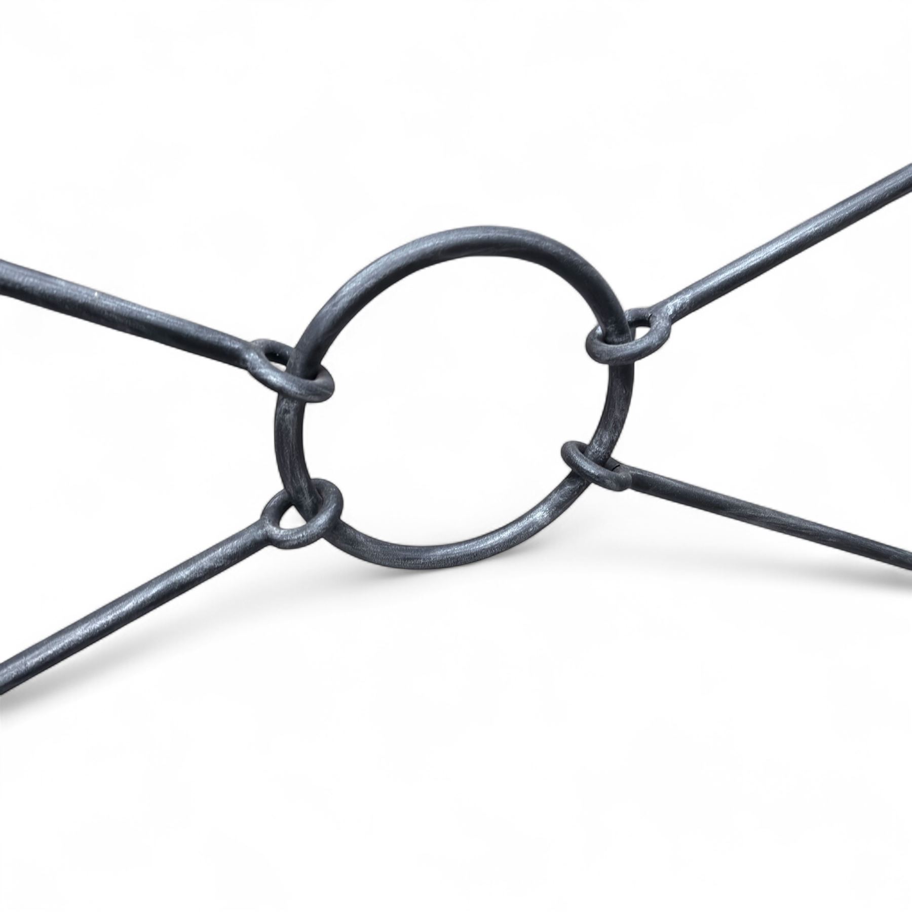 Wrought steel rectangular conservatory dining table, with glass top; and six, four side and two armchairs, with lattice backs and X framed bases, loose cushions