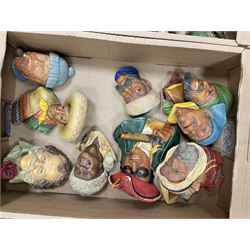Large collection of Bossons plaster wall-masks, including including fisher man, policeman, highway man, etc, in four boxes 