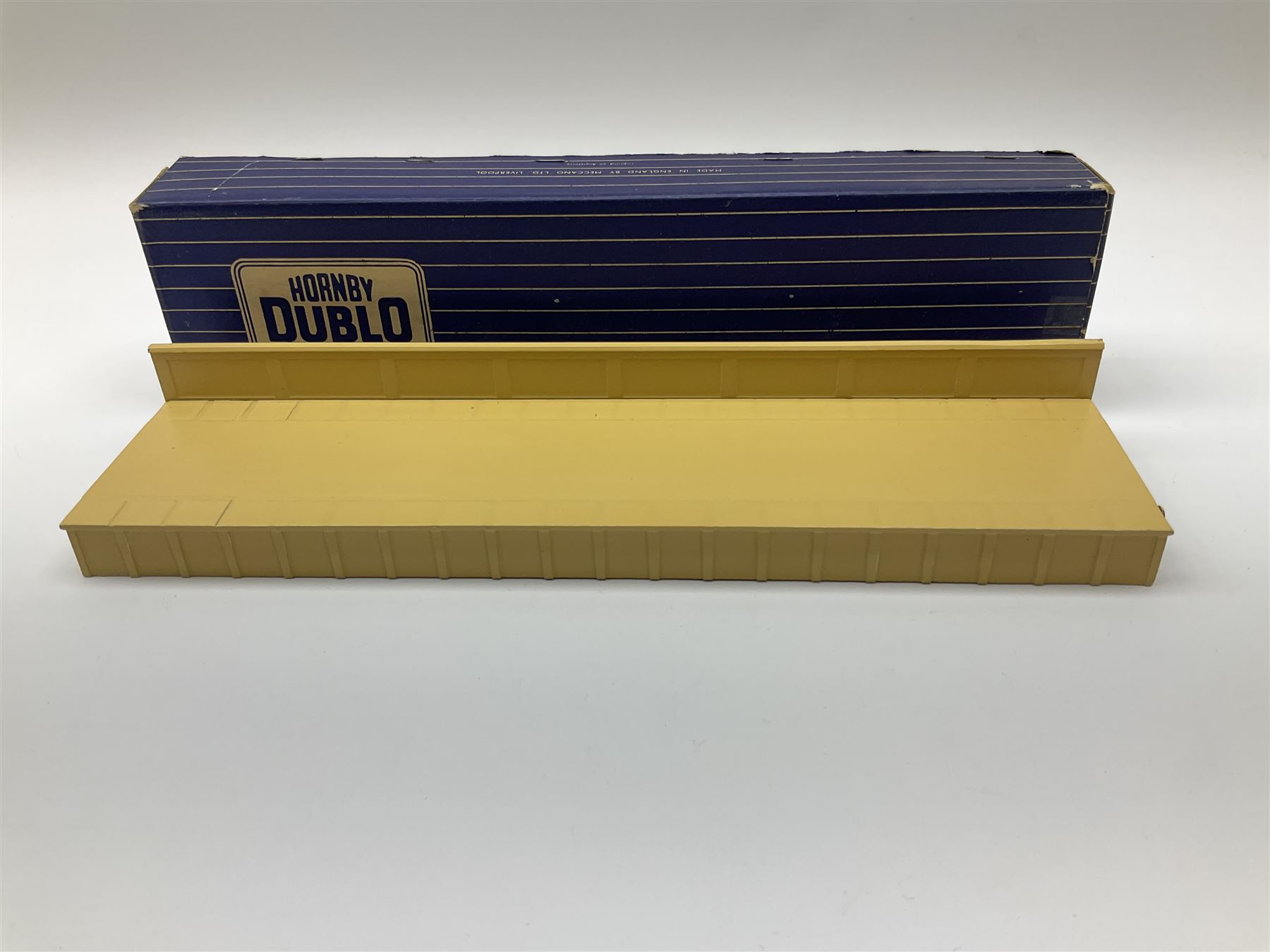 Hornby Dublo - six D1 accessories comprising Turntable; Through Station with white edges and separately boxed Platform Extension with Wall; Signal Cabin with orange roof and pack of station names; Level Crossing; and Island Platform; all boxed (6)