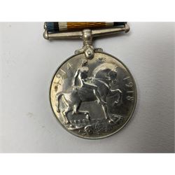 WW2 German Luftwaffe Mess cutlery comprising table spoon and fork, each with H.M.Z.38 mark; WW1 British War Medal awarded to L-13858 Gnr. J. McCabe R.A.; and small quantity of military badges, rank pips etc