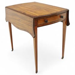 Goergian small butterfly pembroke table, the rectangular top with crossbanded edge and rounded drop leaves, single frieze drawer with opposing dummy drawer, raised on square tapering legs with stringing, terminating in brass castors