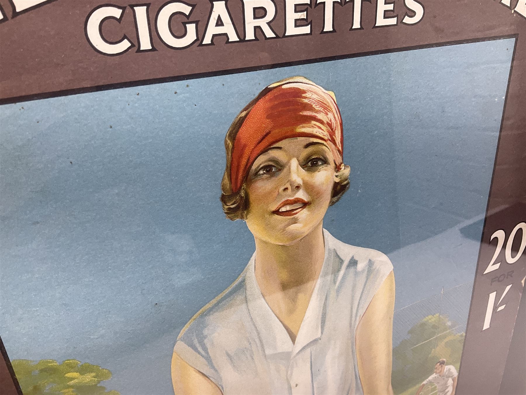 Wills Gold Flake Cigarettes advertising board, framed depicting a lady at the tennis, advert H51cm, L38cm