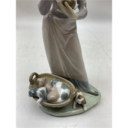 Three Lladro figures, comprising A Lesson Shared, no 5475, My Puppies, no 5807, and Playful Friends, no 5609, all with original boxes, largest example H22cm