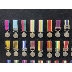 Two limited edition large framed display boards with half-size copies of British Gallantry and Campaign Medals produced by Danbury Mint and entitled 'For Valour'. Sixty medals on each board, all with ribbons. Complete with Danbury Mint certificate serial number A0148 and other paperwork.