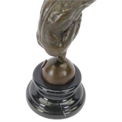 Bronze figure, modelled as a diver with hands raised upon a stepped circular base, H28cm