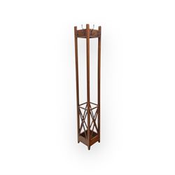 Contemporary mahogany coat and hat stand, tall rectangular form with eight hooks and decorative X-form lower supports