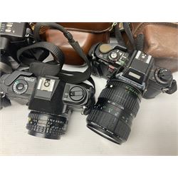 Collection of cameras and lenses, to include Pentax Program A camera body, serial no 123759, with 'Pentax-A zoom 1:3.5-4.5 28-80mm' len, Praktica EE2 camera body with 'Pentacon electric 1.8/50' lens etc, together with a Manfrotto tripod 