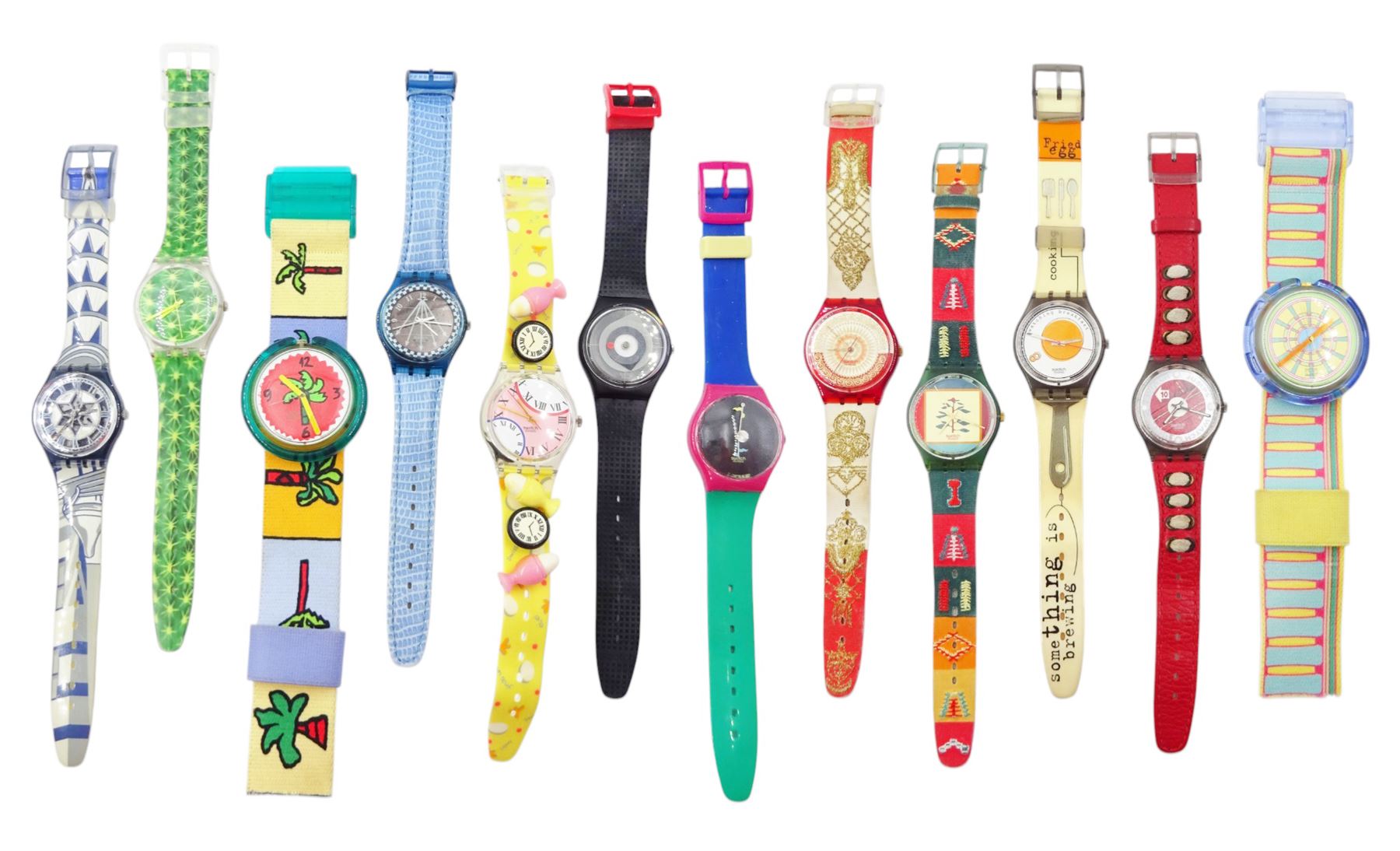Swatch twelve quartz wristwatches including Eggs Dream, Crystal Surprise, Point of View, Pop and watching breakfast, three cased and a Swatch catalogue