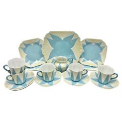 Shelley Dainty pattern tea wares, of lobed form with blue star decoration on merging white and yellow ground, comprising five teacups, five saucers, six tea plates, milk jug and cake plate, all with printed green mark beneath, some with painted pattern no 11770