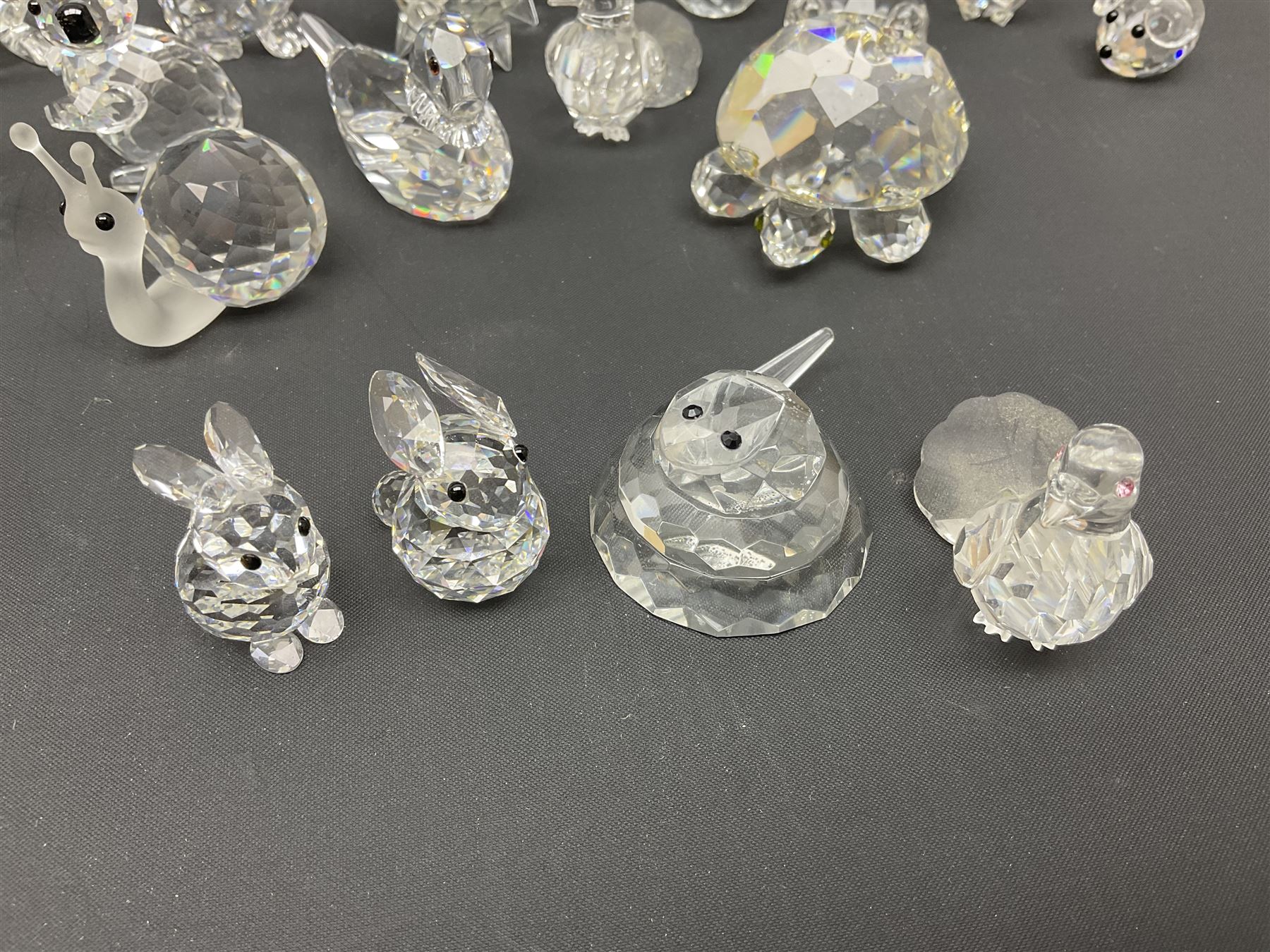 Collection of Swarovski Crystal animals, to include hedgehogs, snails, birds, mice and snakes, etc