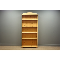  Ikea pine bookcase fitted with five shelves, W85cm, H189cm, D31cm  