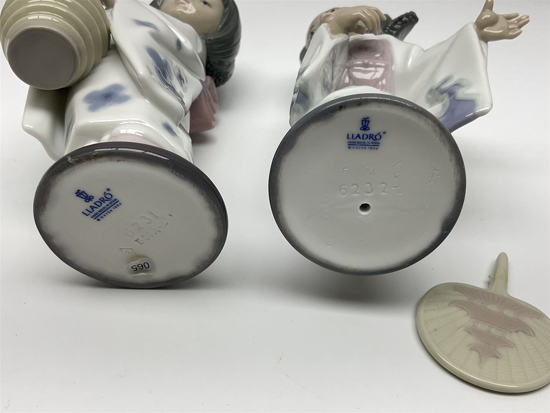 Six Lladro figures of the China doll set and Oriental doll set, comprising Playing the Flute no.6150, Bearing Flowers no.6151, Flower Gazer no. 6152, Oriental Dance no. 6230, Oriental Lantern no. 6231 and Oriental Beauty no. 6232, largest H20cm