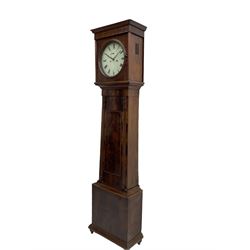 A Scottish mahogany veneered longcase c1820 with a flat top and convex moulding beneath, square hood door with a circular glass dial aperture, turned wooden bezel flanked by plain pilasters and silk backed sound frets to the sides, hood on a tapered trunk with flamed mahogany veneer and applied cushion mouldings, three-quarter length trunk door with crossbanding on a square plinth raised on a deep convex moulding and four turned bun-feet, white painted 12” dial with Roman numerals, minute track and subsidiary seconds dial, with plain blued steel moon hands and seconds pointer, dial pinned via a Wilson cast iron false plate to an eight day rack striking movement with a recoil anchor escapement, striking the hours on a bell. With weights and pendulum.