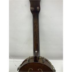 George Formby banjolele with metal plaque to headstock L55cm; in carrying case with instruction booklet.