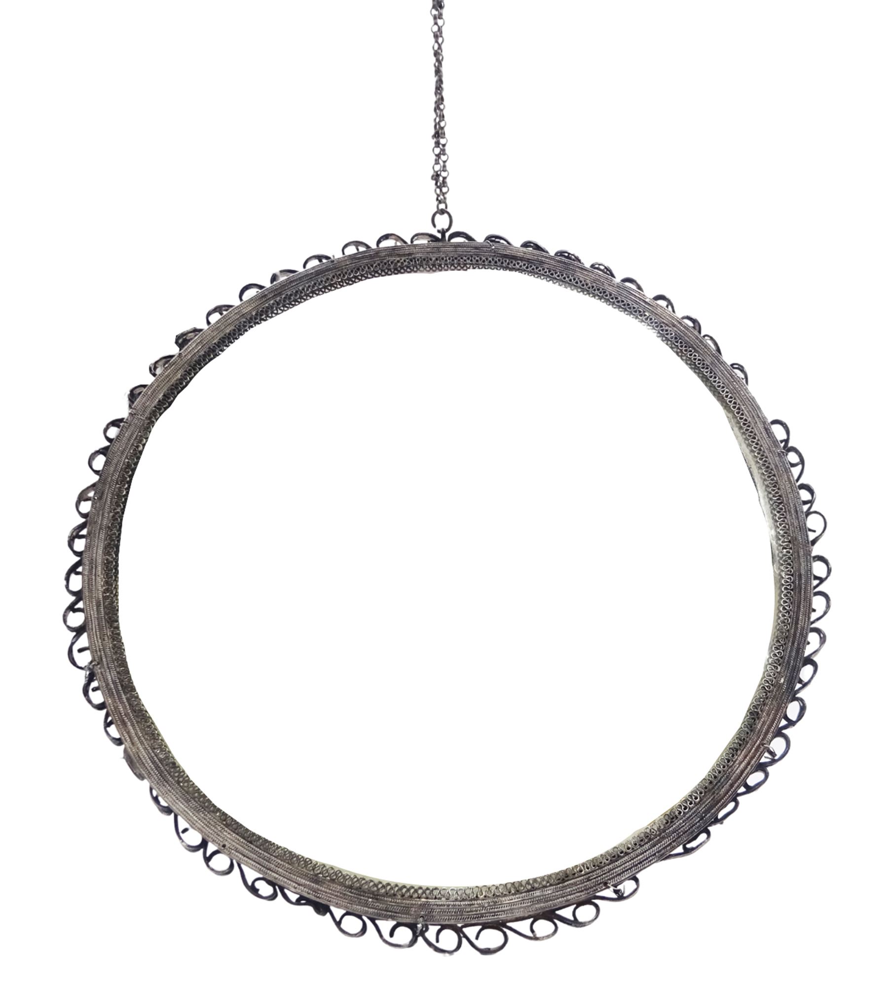 Eastern silver filigree wedding or travel mirror, or circular form with profuse scrolling and foliate filigree work verso, D26cm