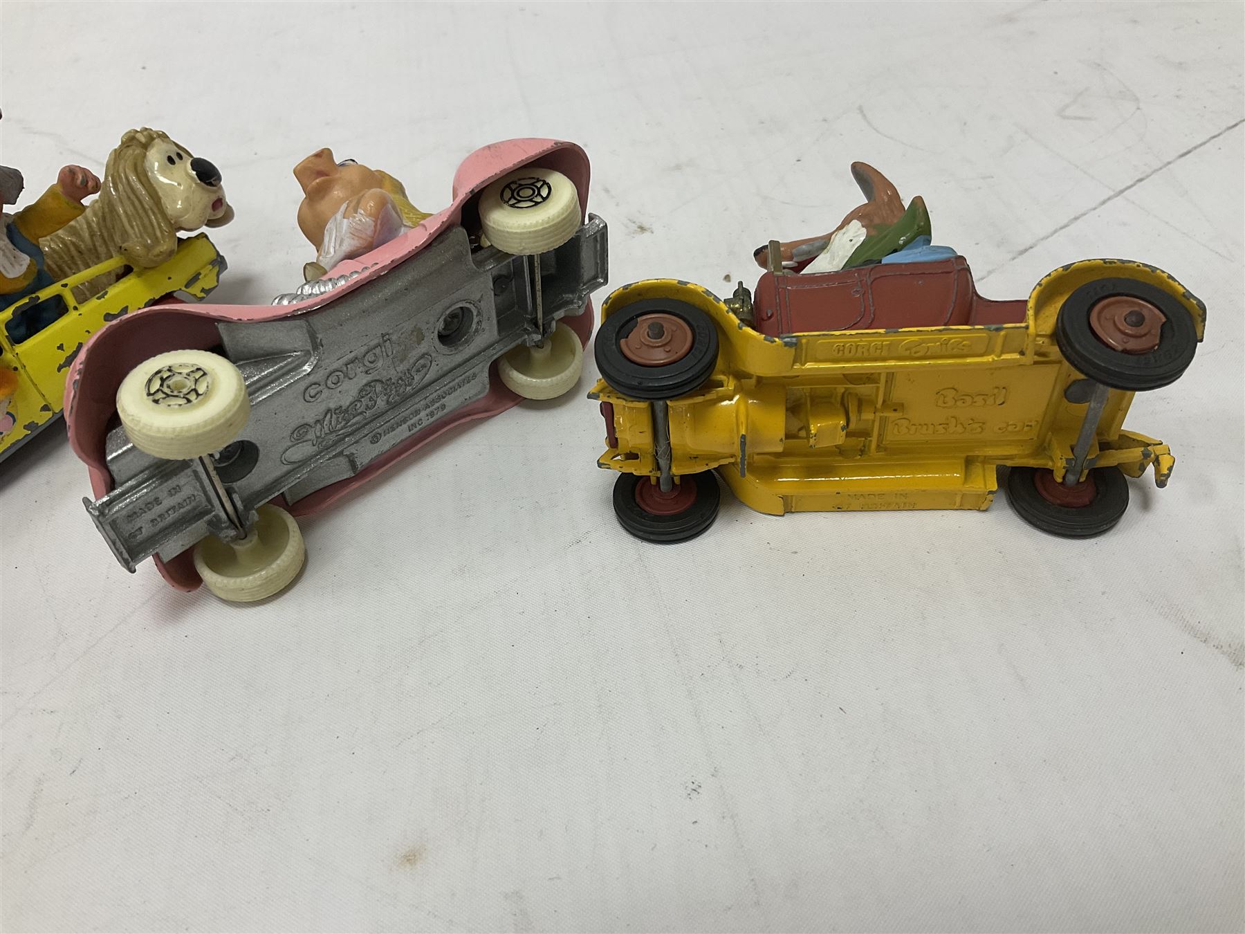 Corgi - ten unboxed and playworn TV/Film related die-cast models including three Popeye Paddle Wagons; Dick Dastardly; Magic Roundabout; Muppets; Batman Penguinmobile; and Basil Brush (10)