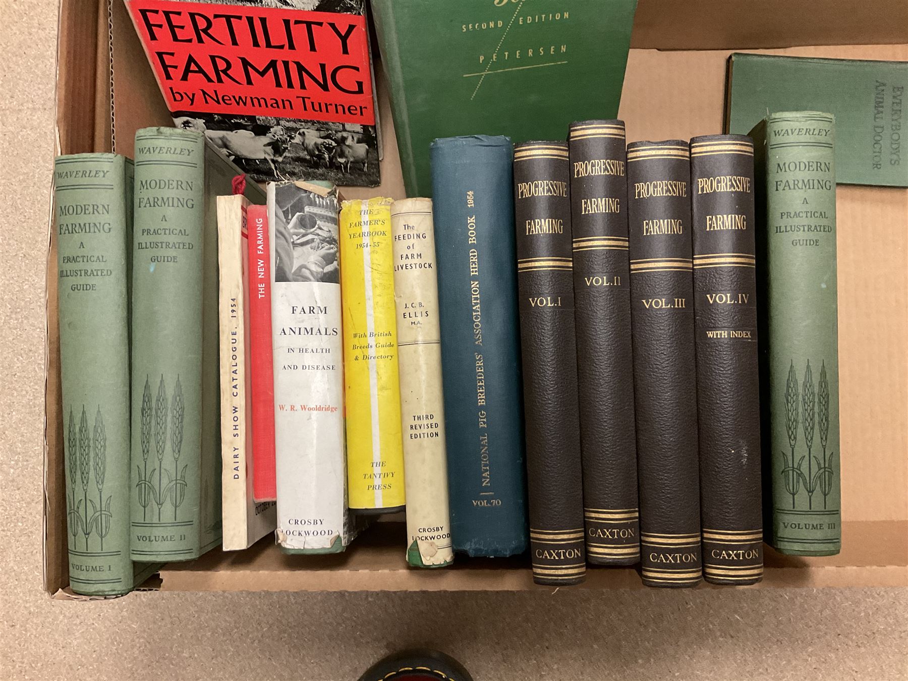 Two volumes of the Concise Household Encyclopedia together with Encyclopedia of Useful Information & Atlas of the World, two volumes of the Cathedrals of England and Wales and various books on farming, in two boxes