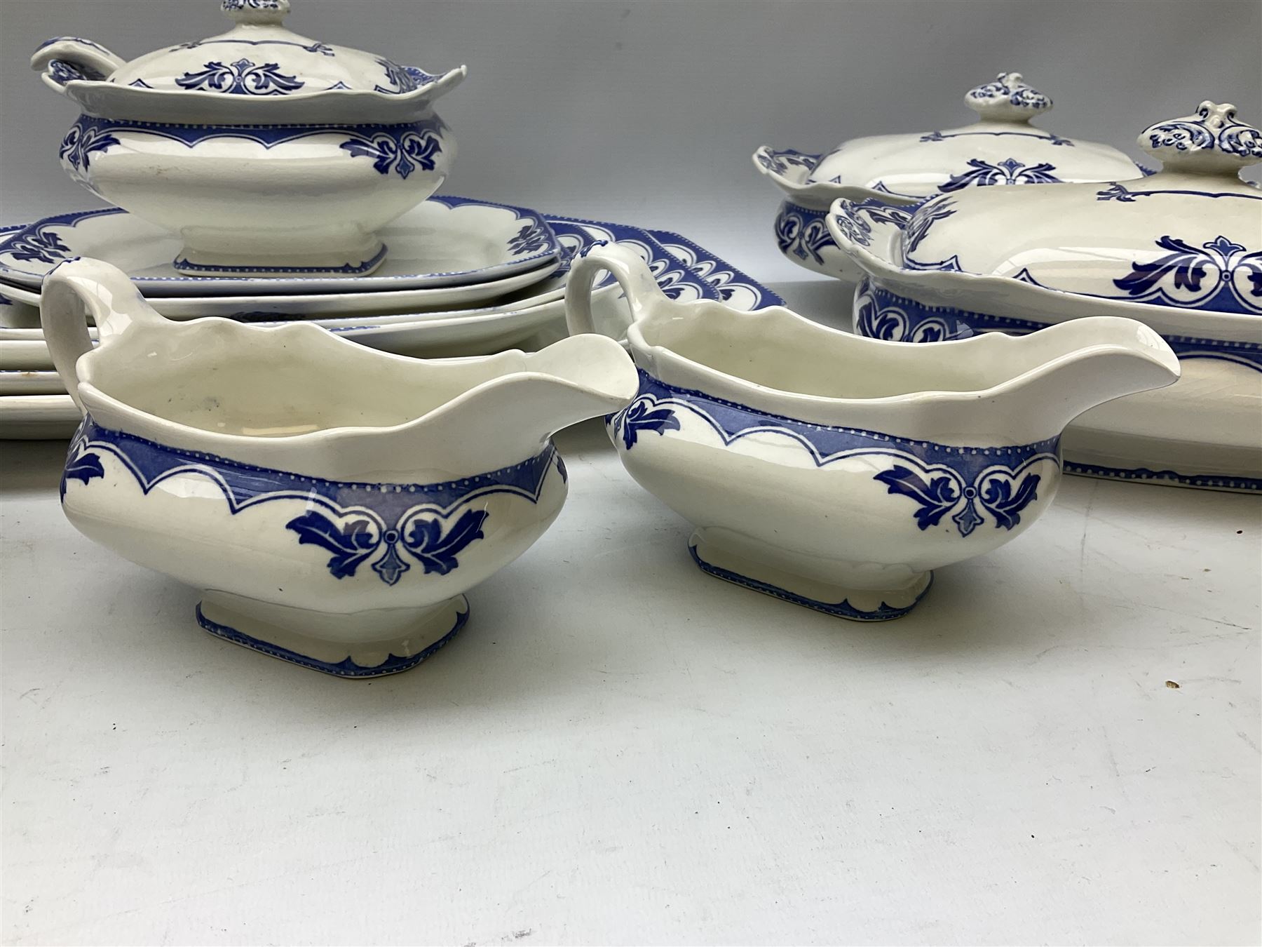 Burgess and Leigh Middleport pottery dinner wares decorated in the ‘Milford’ pattern, to include lidded tureens, graduated meat plates, dinner plates etc 