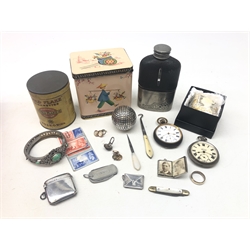  Early 20th century silver-plated pepperette in the form of a golf ball, French pocket watch, silver vesta, silver stamp holder in the form of an envelope by Adie & Lovekin, Birmingham 1914, hip flask dated 1915, Guinness folding pocket knife, stamps, Gold Flake Cigarette tin, silver-plated bangle and miscellanea   